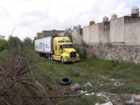 Abandonan tráiler con 157 cadáveres en Jalisco