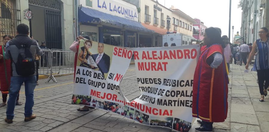 Trifulca entre triquis y comerciantes del 20 de Noviembre