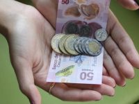 Perfilan incremento del mínimo a 102 pesos